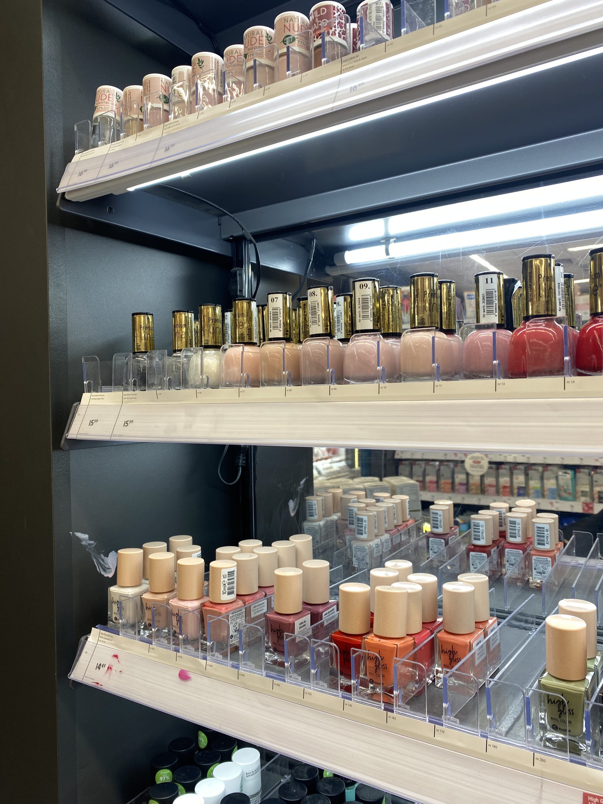 4.5mm magnetic power track used with LED shelf lighting in metal retail shelving